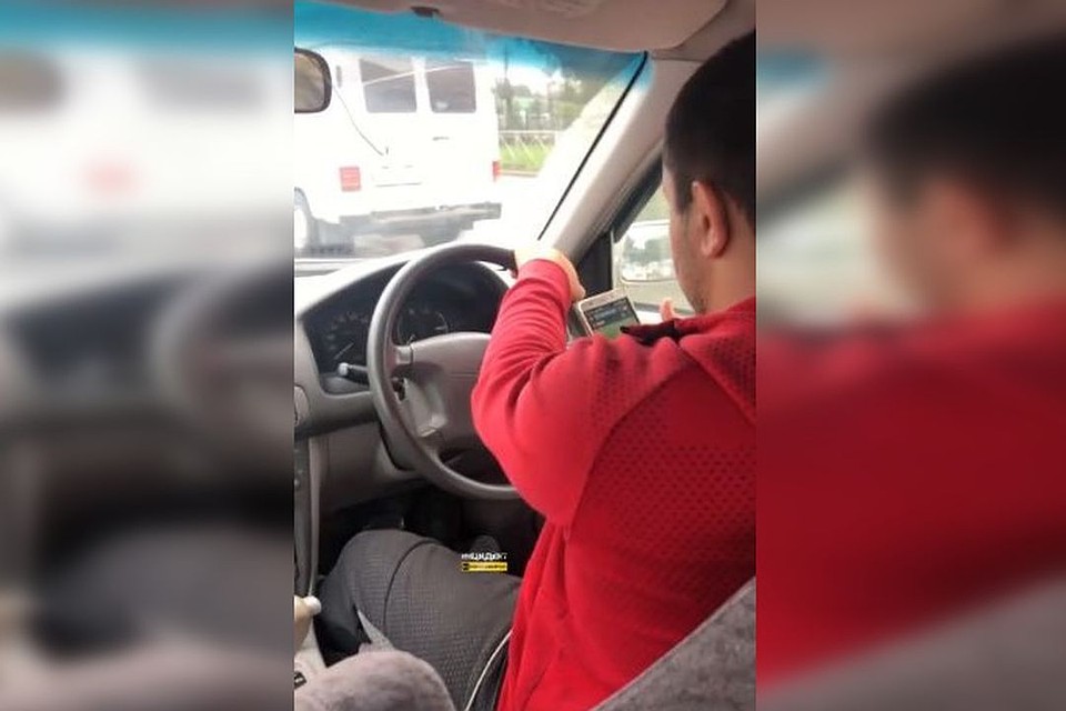 Водитель смотрел футбол, пока вез пассажирку. Стоп-кадр с видео: "Инцидент. Новосибирск".