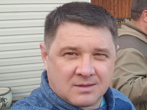 Евгений Телков